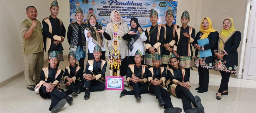 Penyuluh KUA Batanghari Dampingi DPC LASQI Raih Juara 1 Festival LASQI Nusantara Jaya